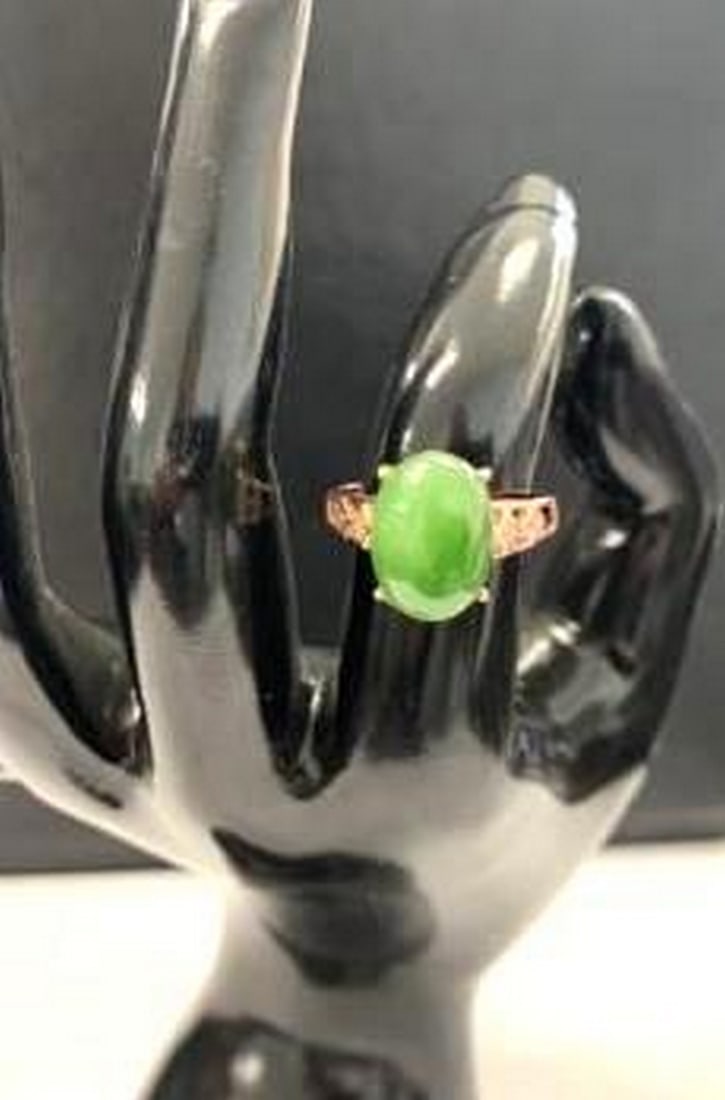 Adjustable Gold-Plated Ring with Oval Green Stone: Adjustable Gold-Plated Ring with Oval Green Stone Elevate your everyday style with this beautiful adjustable gold-plated ring, designed to fit comfortably on any finger. The centerpiece features a