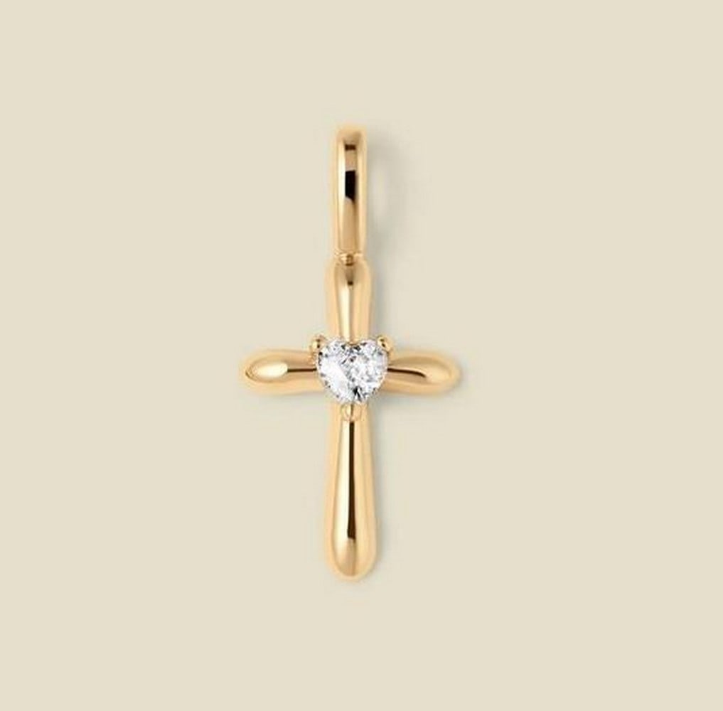 Gold Vermeil Heart Cross Charm with CZ: Gold Vermeil Heart Cross Charm with CZ A heart and cross combined into a single charm design, featuring a cubic zirconia heart at the center for subtle contrast and light reflection. Designed for easy