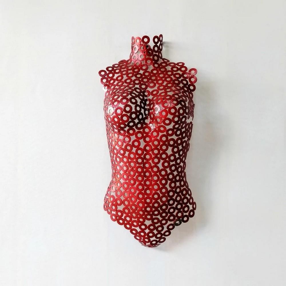 Sculptural Elegance: Red Metallic Woman Torso: Sculptural Elegance: Red Metallic Woman Torso This contemporary metal wall sculpture captures the essence of femininity with its sleek, abstract design. Handcrafted from metal and carefully welded to