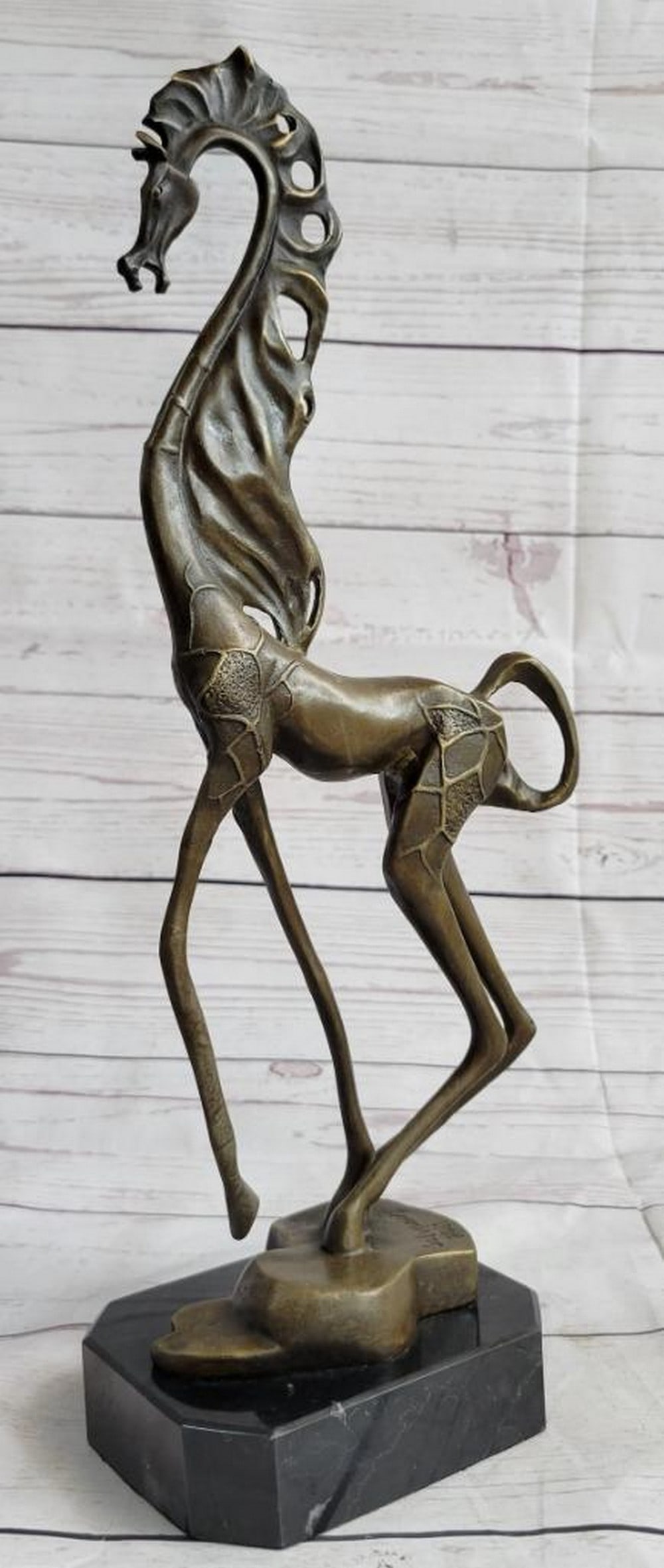 Surrealist Horse Inspired Bronze Sculpture by Salvador Dali - 15" x 9": Surrealist Horse Inspired Bronze Sculpture by Salvador Dali - 15" x 9" This striking bronze sculpture pays homage to Salvador Dali's deep affection for horses, blending surrealist elements
