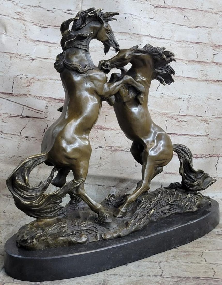 Dueling Stallions Rearing Horse Bronze Sculpture by Milo - 14.5" x 15": Dueling Stallions Rearing Horse Bronze Sculpture by Milo - 14.5" x 15" This striking bronze sculpture captures the raw power and intensity of two stallions rearing in a dramatic duel. Their mu