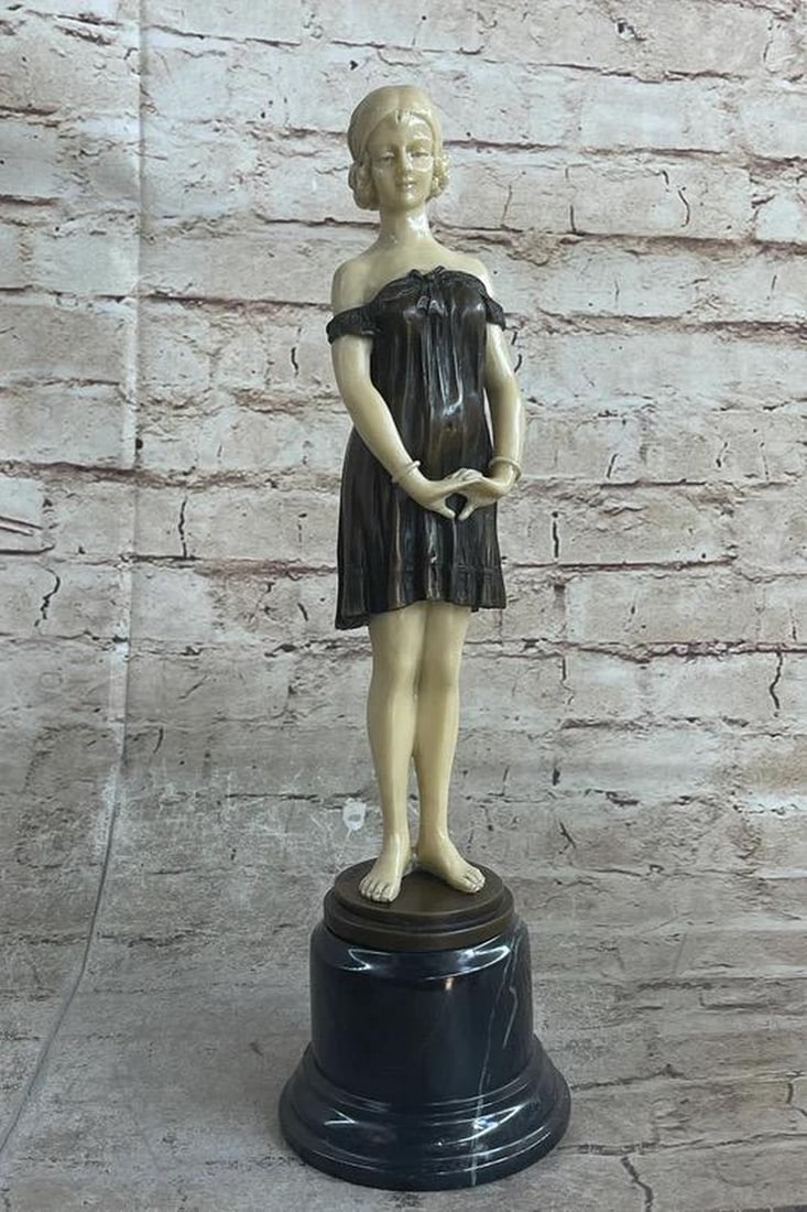 Posing Victorian Girl Inspired Bronze Statue - 13.5" x 4": Posing Victorian Girl Inspired Bronze Statue - 13.5" x 4" This timeless bronze statue, crafted through the traditional Lost Wax Casting Process, captures the grace and precision of a beauti