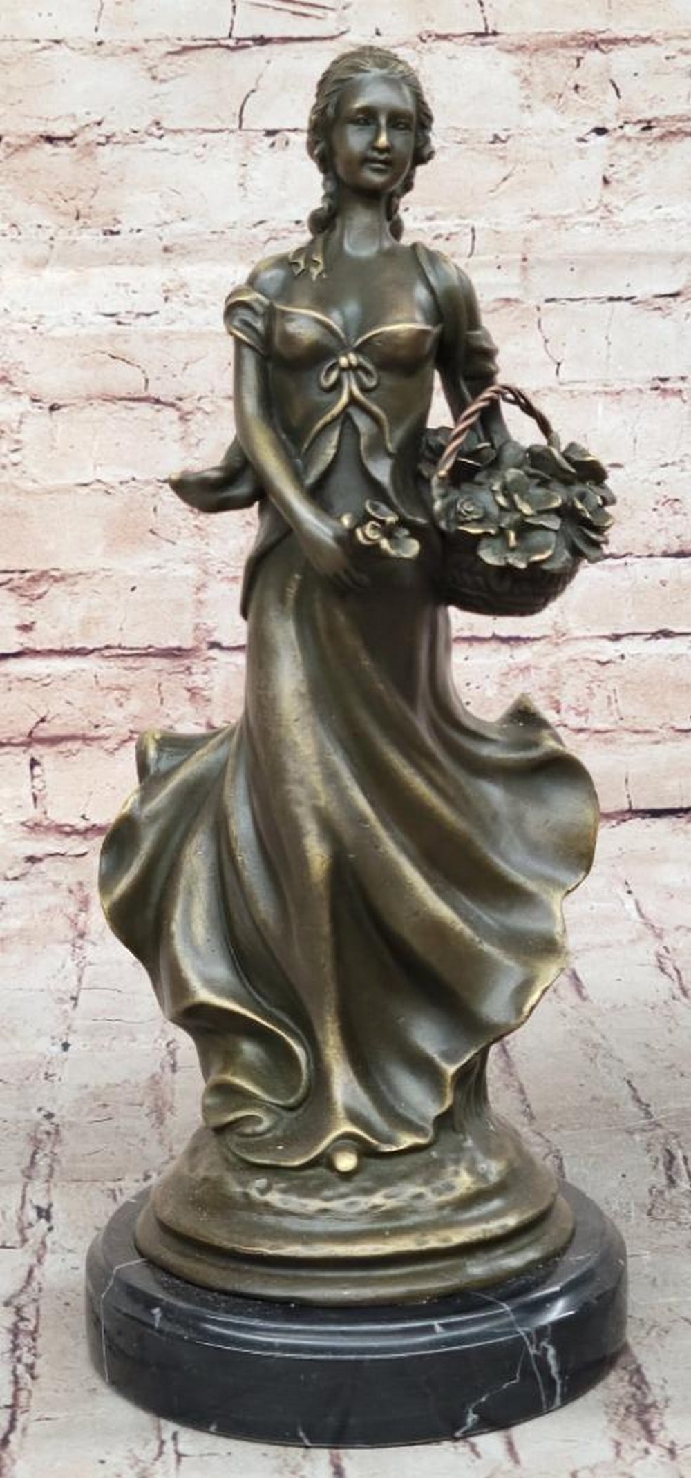 Women Holding Basket of Flowers Original Bronze Statue - 14" x 6": Women Holding Basket of Flowers Original Bronze Statue - 14" x 6" This exquisite bronze sculpture depicts a pure maiden enjoying a peaceful stroll through the woods, pausing to gather a bouq