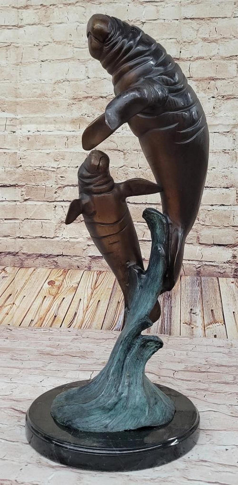 Mother Manatee and Calf Original Bronze Sculpture Signed by Marius - 21.5" x 9": Mother Manatee and Calf Original Bronze Sculpture Signed by Marius - 21.5" x 9" Immerse yourself in the enchanting world of marine life with this limited edition original artwork by Marius. Cr