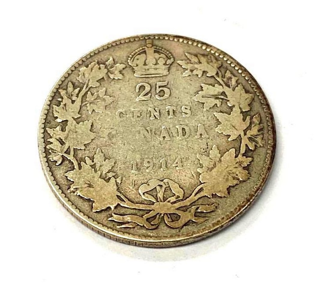 1914 Canadian 25 Cent Coin: Obverse The portrait in left profile of George V is surrounded with the inscription "GEORGIVS V DEI GRA: REX ET IND:IMP" (George V, King and Emperor of India by the grace of God) Lettering: GE