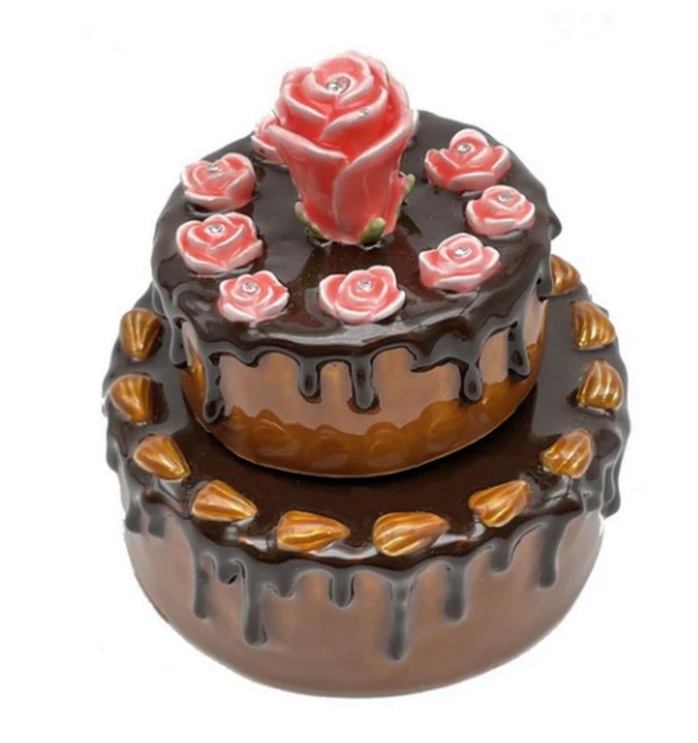 Musical Brown Birthday Cake Box Playing 'Happy Birthday': Musical Brown Birthday Cake Box Playing 'Happy Birthday' A delightful Enamel Painted Trinket Box, adorned with Austrian Crystals and plated with 24K gold, resembling a Brown Birthday Cake. Eac