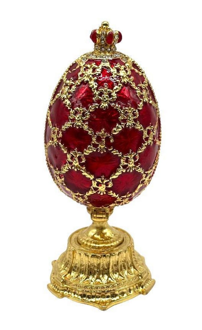 Red & Gold Coronation Trinket Box: Red & Gold Coronation Trinket Box This is an enameled trinket box with a red coronation design accented with gold embellishments. The box is also accented with Austrian crystals, and has a magnet