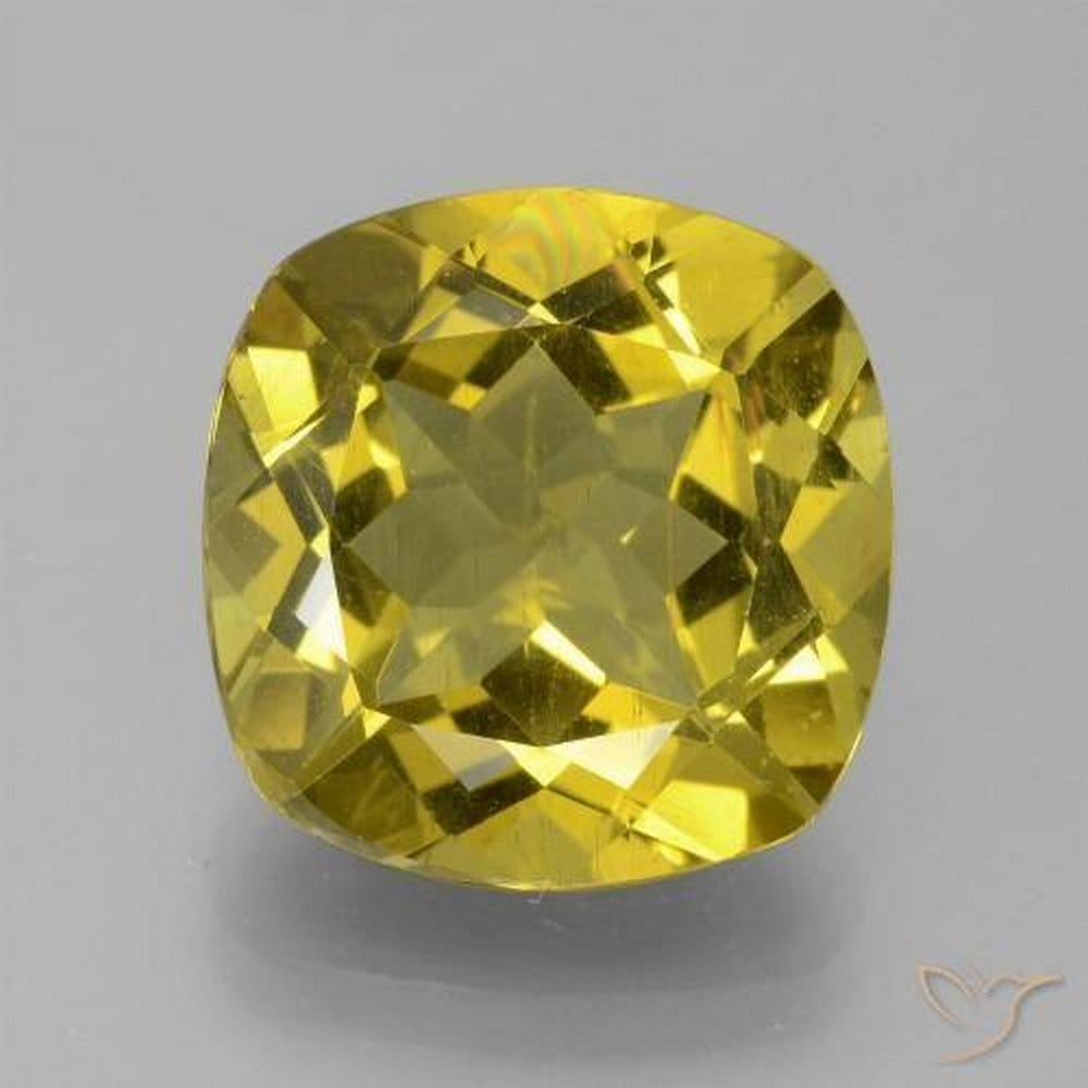 9.42 ct Dijon Yellow Apatite, Cushion Cut, VS, Madagascar: 9.42 ct Dijon Yellow Apatite, Cushion Cut, VS, Madagascar Natural apatite gemstone weighing 9.42 ct, cut in a cushion shape with a rich dijon yellow color. The gem measures 13.47 x 13.26 x 7.78 mm (ca