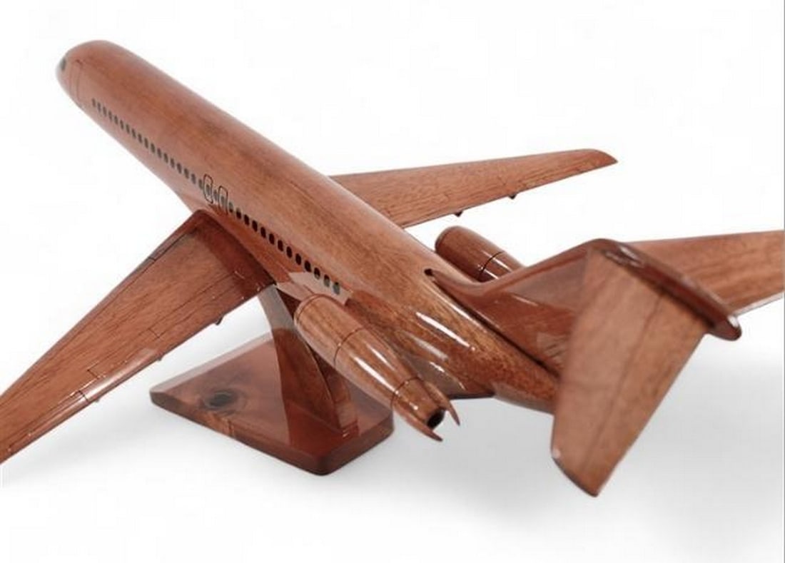Douglas DC-9 Wooden Model: Douglas DC-9 Wooden Model Step back in time with the McDonnell Douglas DC-9 Model, a finely detailed homage to the classic single-aisle airliner from the esteemed Douglas Aircraft Company. Handcrafte