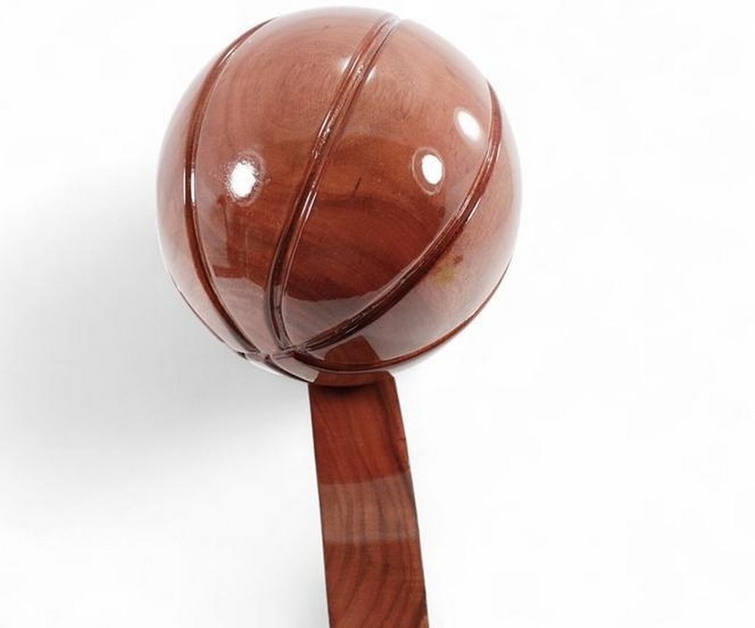 Timber Hoops: The Artisan Basketball: Timber Hoops: The Artisan Basketball- Made from Mahogany Wood. A unique fusion of craftsmanship and sport that brings a natural twist to your game. Handcrafted from premium mahogany wood, this