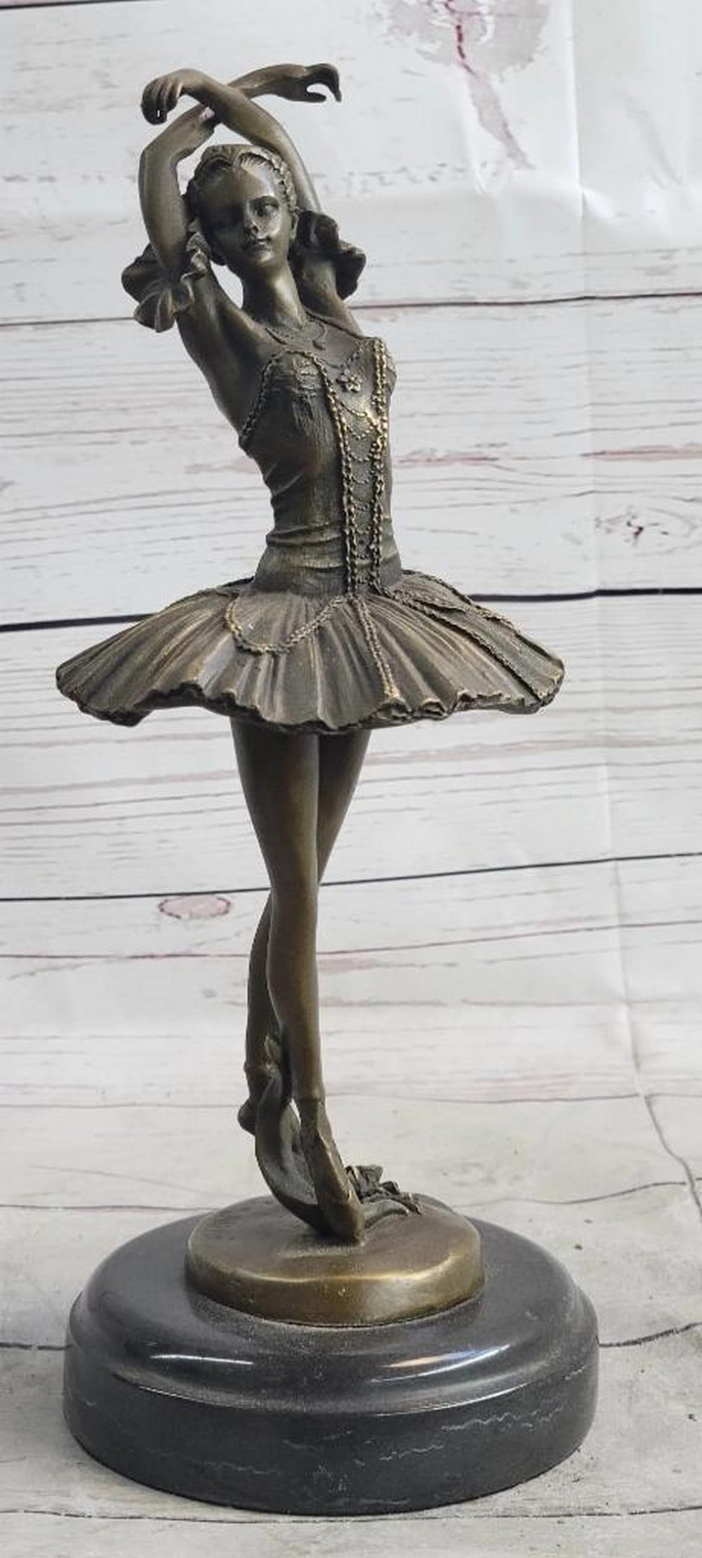 Ballerina Ballet Dancer Fifth 5th Position Bronze Sculpture Statue Figure Art Decor Marble Base: The ballerina stands tall and elegant as she looks to the heights of the balcony lovingly admiring the audience. She wears a tiara and a modern tutu, the classic costume of the ballet dance, which has