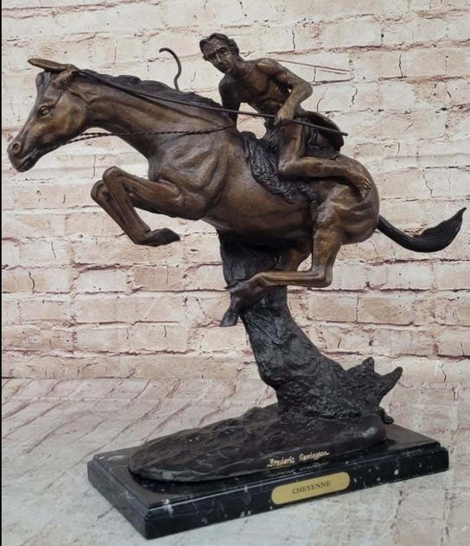 Remington Inspired Native American On Horseback Bronze Sculpture - 17" x 19": Remington Inspired Native American On Horseback Bronze Sculpture - 17" x 19" A native American Indian gallops across the desert with his horse. Armed with a spear, he leans into his horse`