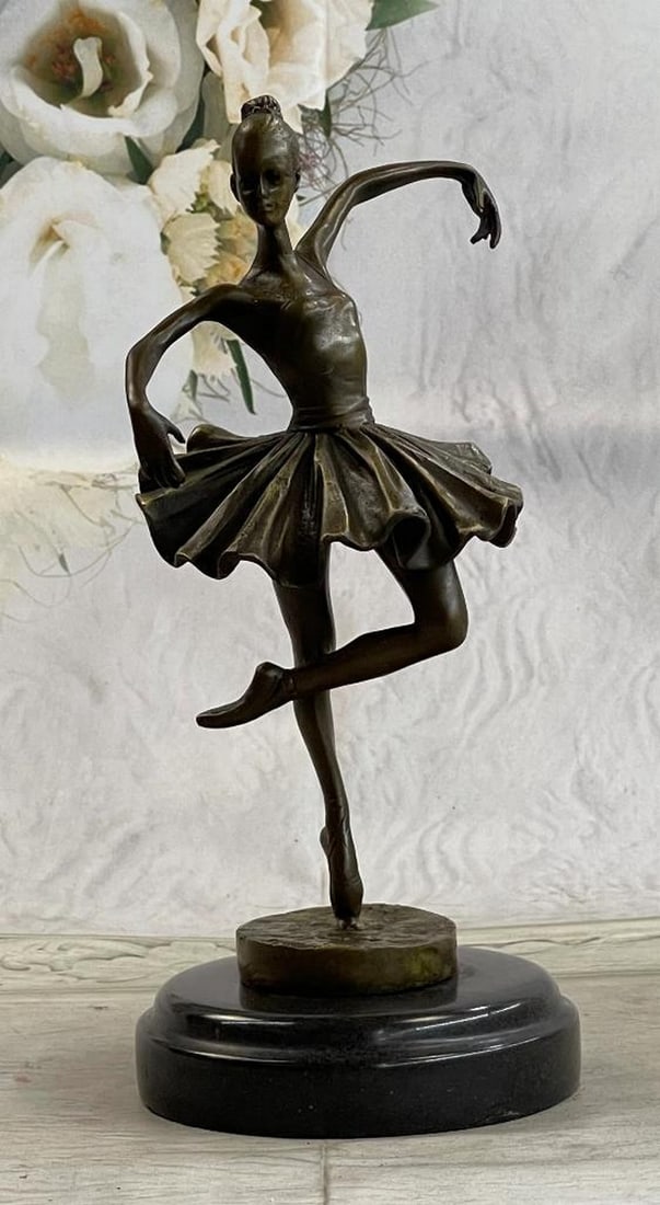 Original Bronze Statue "FREE AS BIRD" Ballerina Dancer On MAarble Base - 5lbs: This stunning bronze sculpture captures the grace and beauty of a ballerina in a classic pose. Standing on her tiptoes, she holds her hands above her head, crossed one atop the other, while gazing upw