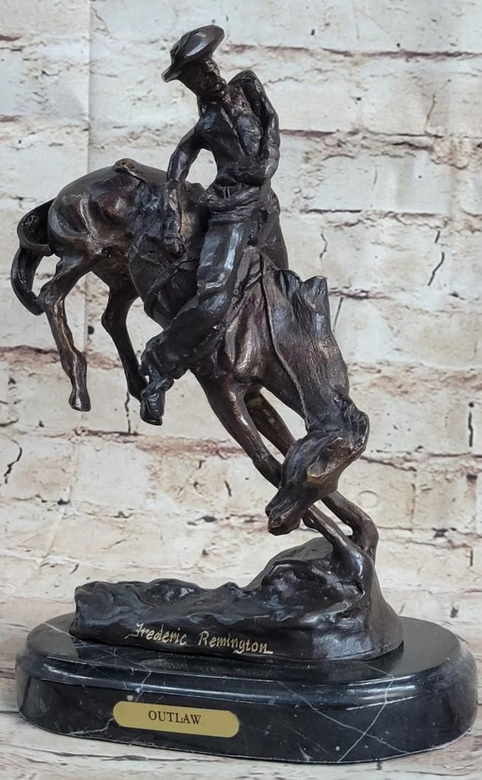 Remington Inspired 'Outlaw' Bronze Sculpture - 10.5" x 9": Remington Inspired 'Outlaw' Bronze Sculpture - 10.5" x 9" This bronze sculpture depicts a seasoned cowboy patrolling the open plains on his loyal horse. The cowboy is dressed in a shi
