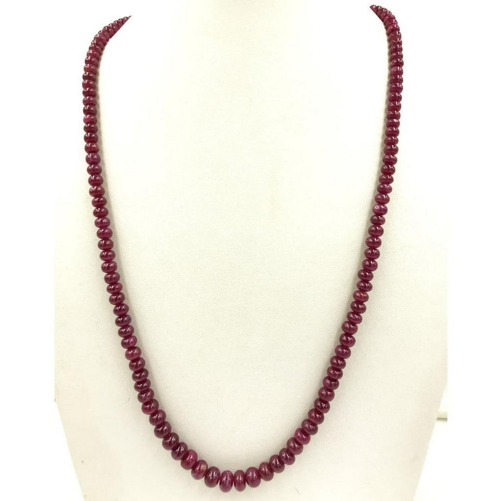 18" Ruby Beads String Necklace: 18" Ruby Beads String Necklace Introducing our Ruby Plain Beads String, a masterpiece of understated elegance. The beads, ranging from 4.9 to 7.8 mm in diameter, showcase the deep and lustrous hu
