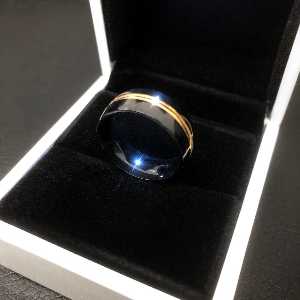 Ladies Titanium Black And Gold Engagement Ring: Ladies Titanium Black & Gold Engagement Ring, Brand New, Size 8. Comes In White Enameled LED Ring Box. See Photos For Further Inspection.