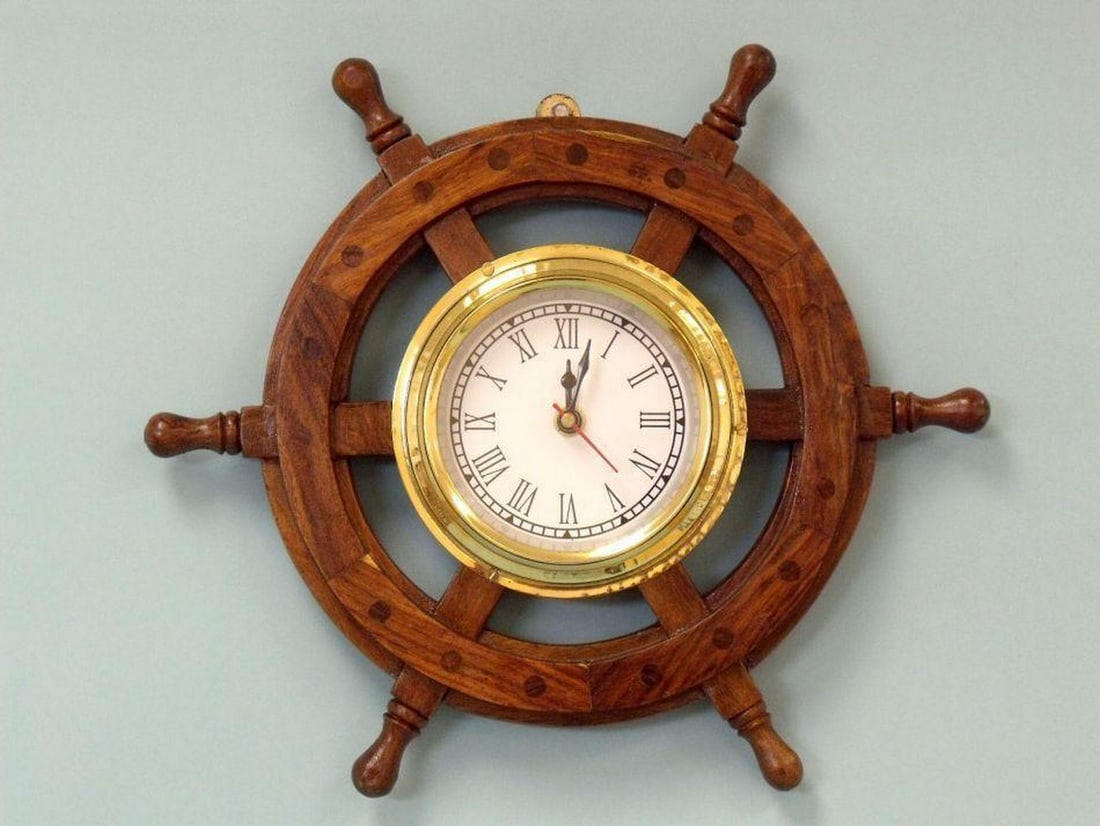 12" Premium Classic Wood and Brass Ship Wheel Clock: 12" Premium Classic Wood and Brass Ship Wheel Clock Enrich your maritime decor with the 12" Premium Classic Wood and Brass Ship Wheel Clock, a harmonious blend of elegance and nautical allure