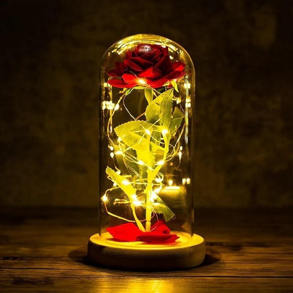 Enchanted Rose: A Glimmering Tale of Beauty LED Light: Enchanted Rose: A Glimmering Tale of Beauty LED Light A breathtaking display that captures the essence of timeless romance and magic. Encased in a glass dome, this stunning rose is illuminated by sof