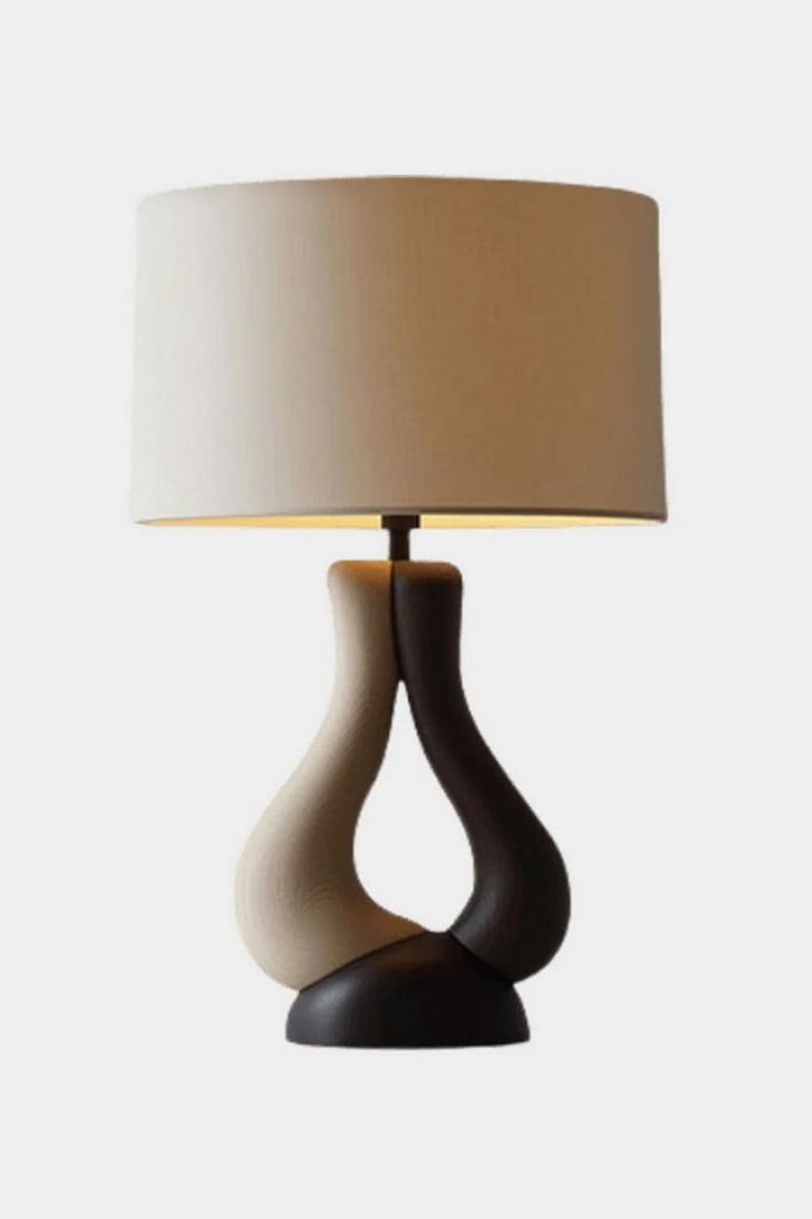 Contemporary Intertwined Form Table Lamp: Contemporary Intertwined Form Table Lamp Sculptural and serene, this contemporary table lamp features an elegantly intertwined base that flows in soft, organic curves—suggesting balance, contrast, a