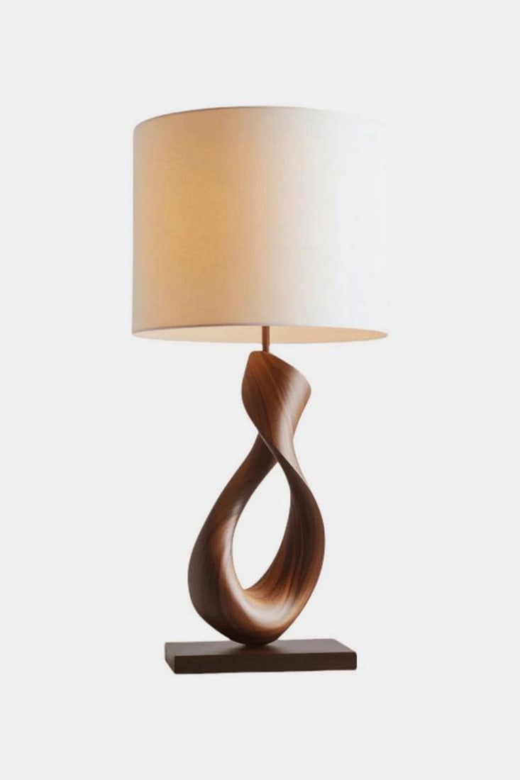Contemporary Twisted Loop Wood Lamp: Contemporary Twisted Loop Wood Lamp Elegant and expressive, this handcrafted table lamp features a sculptural wooden base that curves into a fluid loop—evoking motion, balance, and quiet