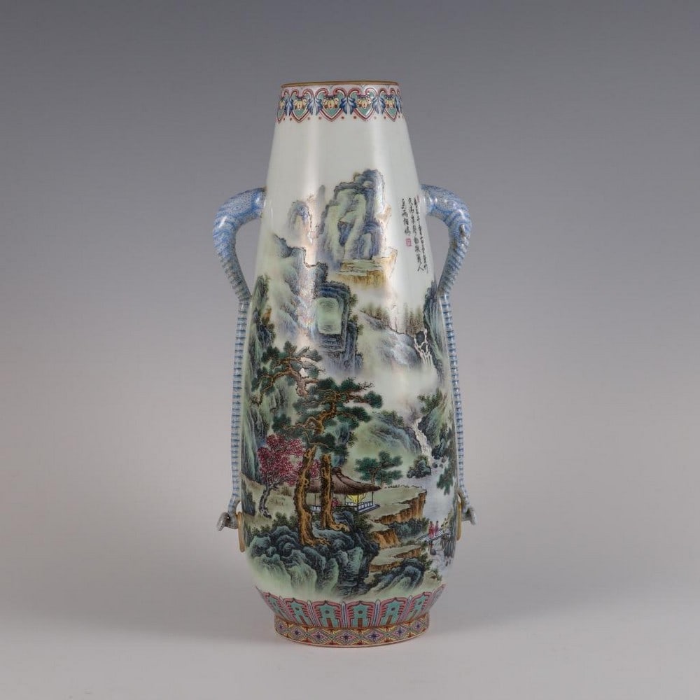 Qing Qianlong Year Famille Rose Landscape and Figure Elephant-Eared Vase: Qing Qianlong Year Famille Rose Landscape and Figure Elephant-Eared Vase A finely crafted porcelain vase from the Qianlong period of the Qing Dynasty, decorated in vibrant famille rose enamels. The bo