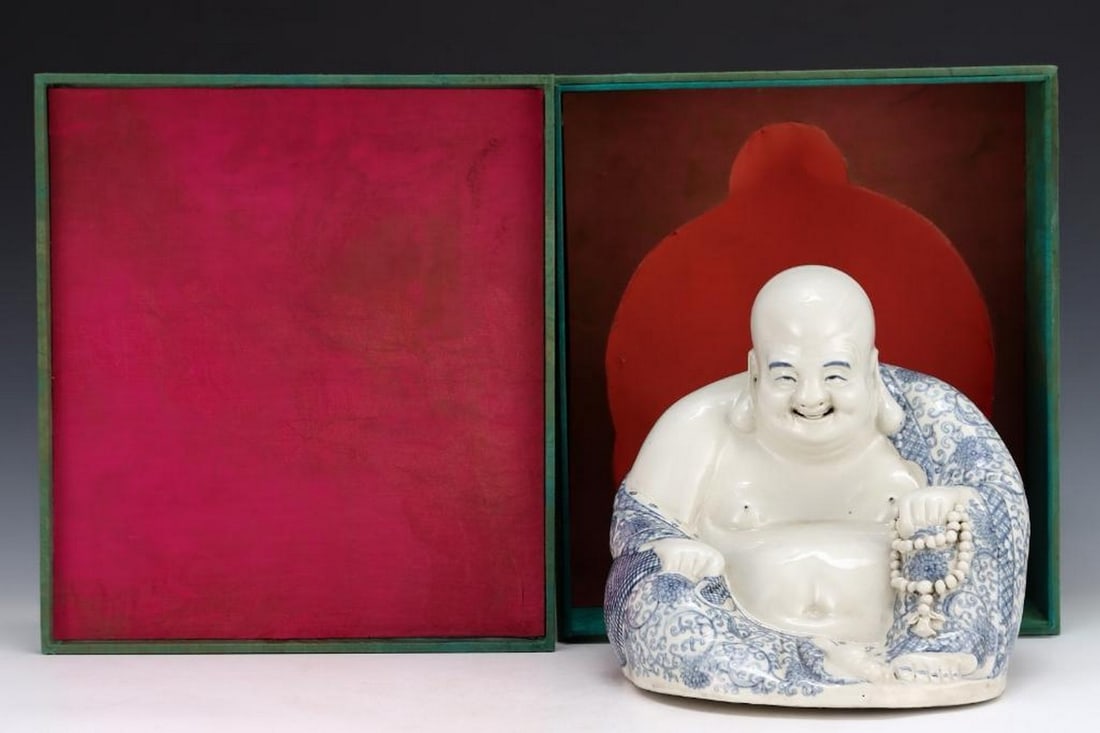 Old Collection Qing Dynasty Blue and White Entwined Lotus Pattern Maitreya Buddha: Old Collection Qing Dynasty Blue and White Entwined Lotus Pattern Maitreya Buddha A finely modeled porcelain figure of Maitreya Buddha from the Qing Dynasty, decorated in classic blue and white underg