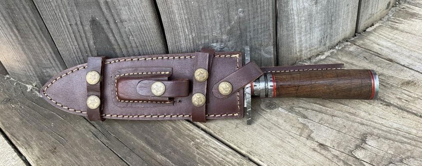 The Northern Boundary Damascus Dagger: Custom Handmade Damascus Steel Dagger Hunting Dagger Knife Handle Walnut Wood with Brass Spacer Damascus Steel Blade with 256 Layers on it. HARDNESS 56-60 H R C VERY HIGH QUALITY GENUINE LEATHER SHEAT