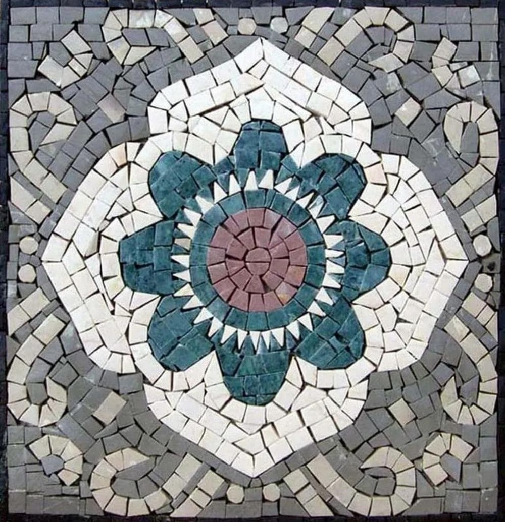 Paradise Flower Mosaic: Paradise Flower Mosaic A handcrafted mosaic artwork made from natural stone. The design features a stylized floral motif, created with hand-cut stone tiles arranged to form a balanced and colorful