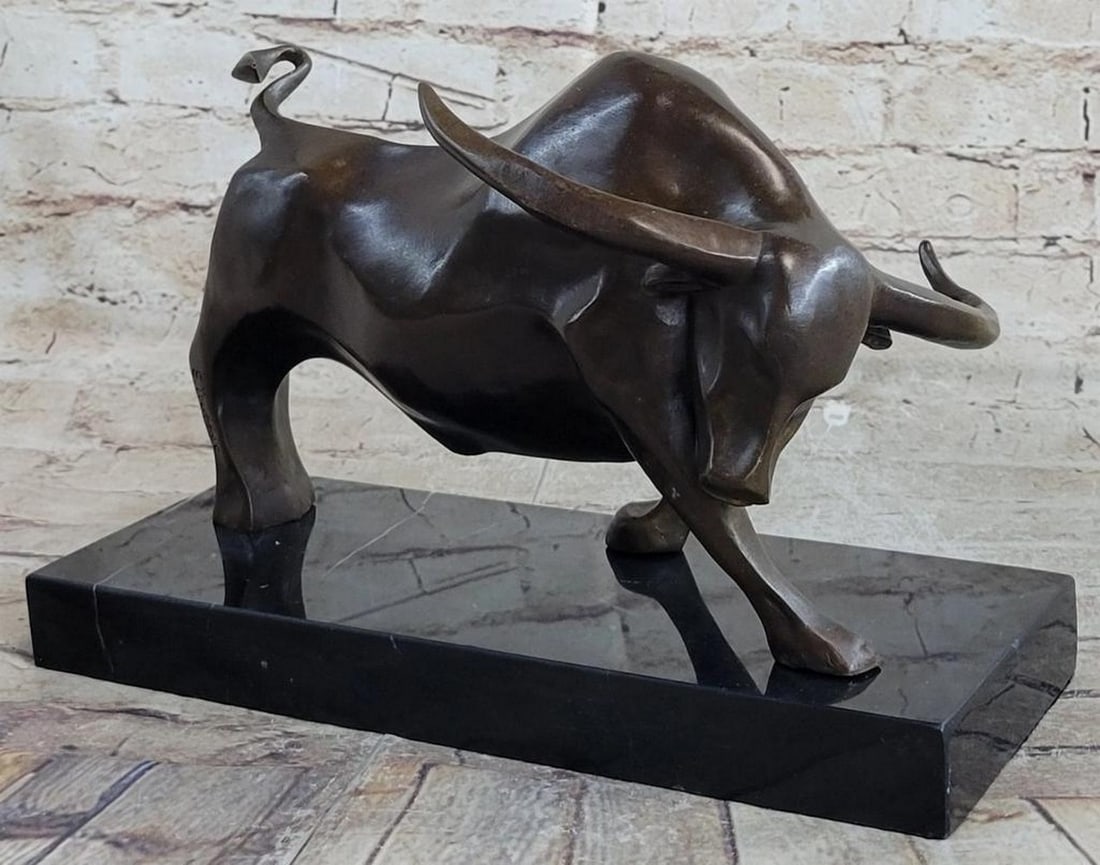 Charging Bull Inspired Bronze Sculpture Signed by E. Truffot - 8" x 12": Charging Bull Inspired Bronze Sculpture Signed by E. Truffot - 8" x 12" Experience the raw power and intensity of the animal kingdom with our breathtaking sculpture, capturing the bull in a m