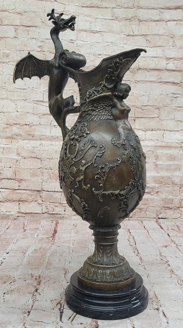 Ornate Bronze Dragon Pitcher Sculpture by Milo – 22" x 10": Ornate Bronze Dragon Pitcher Sculpture by Milo – 22" x 10" This bronze pitcher features elaborate dragon motifs in high relief, entwined among scrolling cloud patterns in a Gothic-inspired s