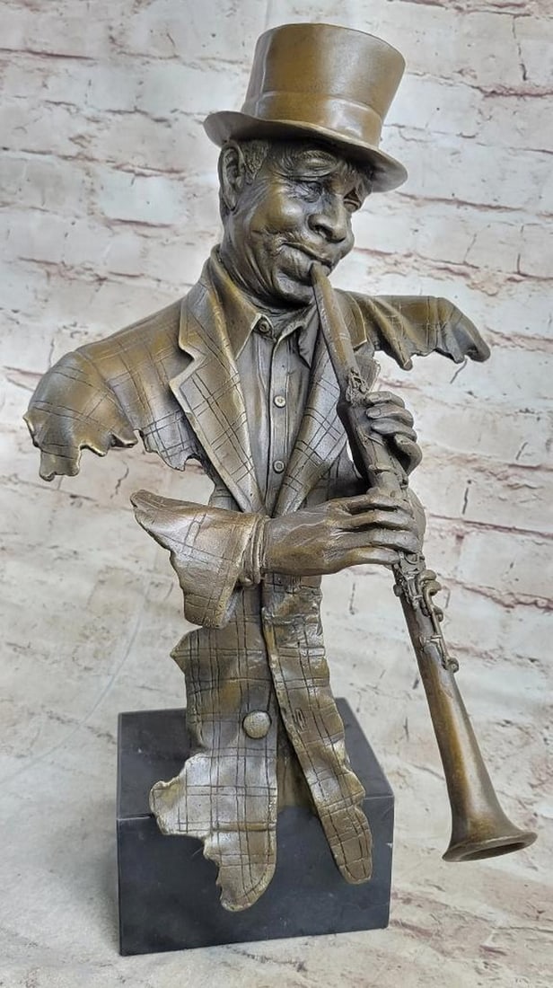 Original Bronze Clarinetist Sculpture by Dwight - 16.5" x 13": Original Bronze Clarinetist Sculpture by Dwight - 16.5" x 13" Celebrate the beauty of music with this stunning 16.5" bronze sculpture of a talented Black musician confidently playing the c