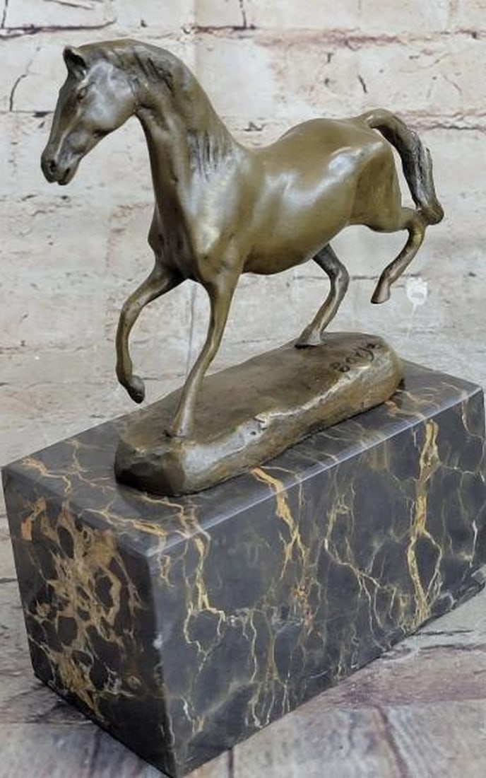 Wild Spirit Bronze Sculpture: Wild Spirit Bronze Sculpture This powerful hot cast bronze reproduction sculpture, bearing the signature of renowned animalier artist Antoine-Louis Barye, captures a galloping horse in full stride, m