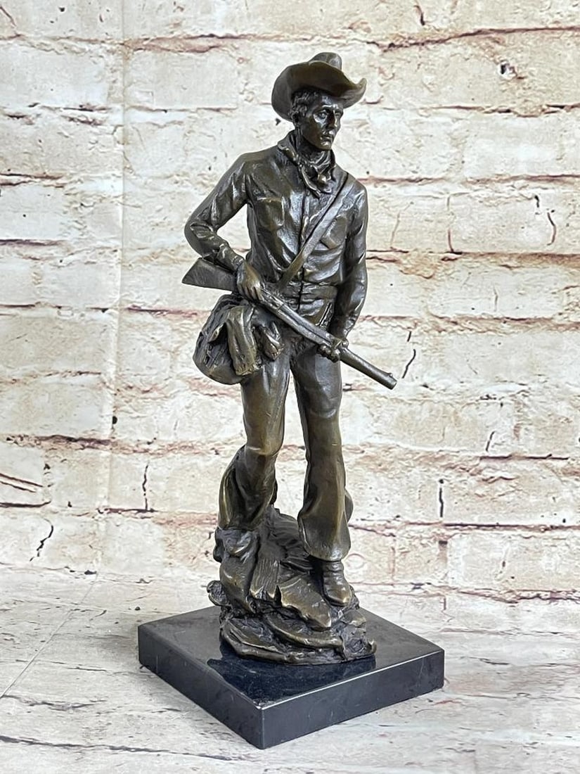 Signed Original Cowboy Bronze Sculpture - 12.5" x 5": Signed Original Cowboy Bronze Sculpture - 12.5" x 5" This is a sculpture of a classic cowboy. He wears his cowboy hat and his handkerchief loosely tied around his neck. On his feet he wears b