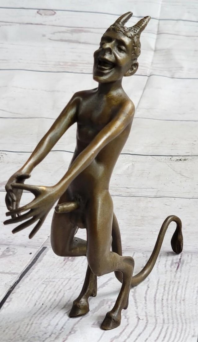 Euphoria of the Satyr Bronze Sculpture: Euphoria of the Satyr Bronze Sculpture This striking bronze sculpture, bearing the signature of renowned artist Milo, captures a moment of serene indulgence in the wild, untamed form of a satyr. Nude