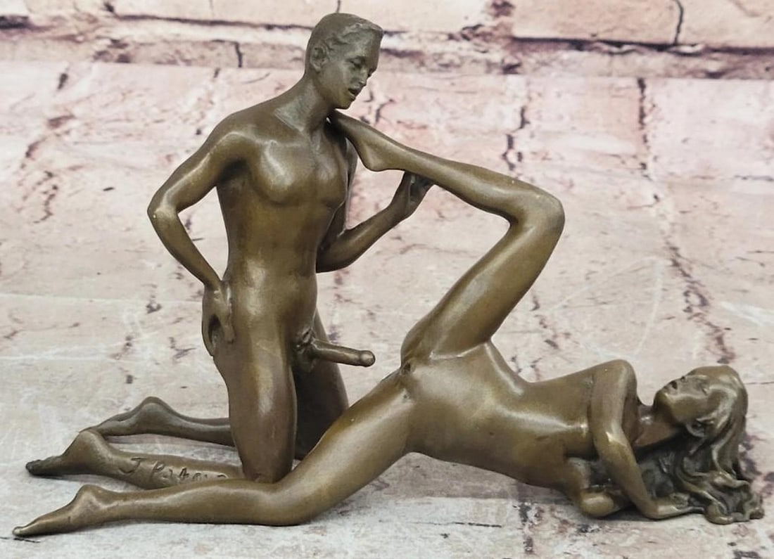 Intertwined Desires Bronze Sculpture: Intertwined Desires Bronze Sculpture This two-piece bronze sculpture, bearing the signature of artist Jean Patou, captures the fluidity of human connection. Featuring a nude man and woman in intercha