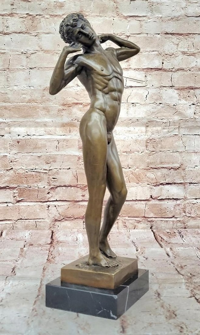 The Human Form Bronze Reproduction Sculpture: The Human Form Bronze Reproduction Sculpture This striking bronze sculpture presents a nude male figure in a poised, contemplative stance, embodying both strength and vulnerability. The figure, captu