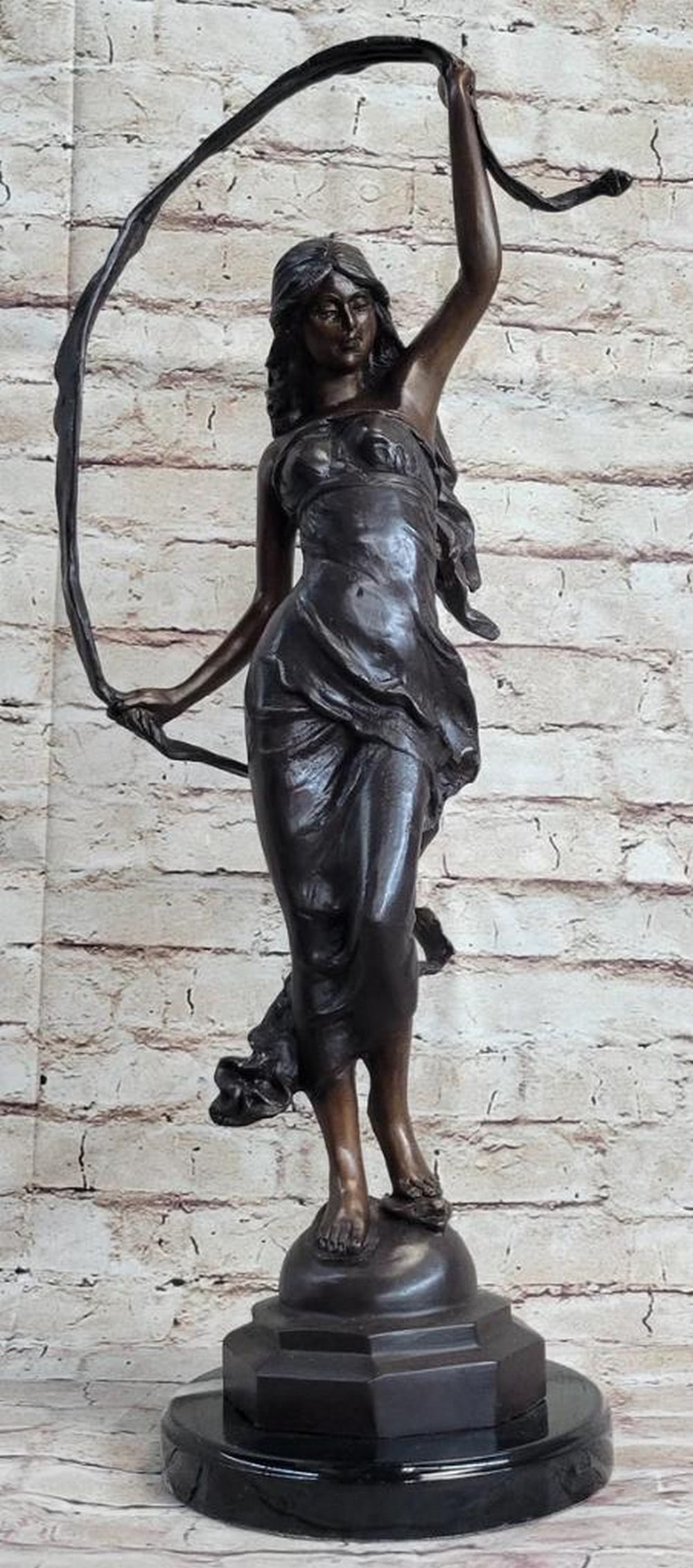 Enchanting Elegance: Inspired Bronze Statue Ribbon Dancer on Cobra Base - 24" x 12": Enchanting Elegance: Bronze Ribbon Dancer on Cobra Base - 24" x 12" Immerse yourself in the mesmerizing world of dance with this exquisite bronze sculpture. Capturing the essence of grac