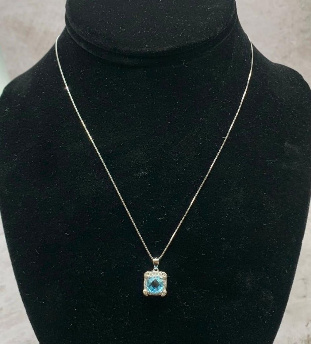 925 Sterling Silver Necklace with Cushion Sky Blue Topaz 7mm Gemstone, 18": 925 Sterling Silver Necklace with Cushion Sky Blue Topaz 7mm Gemstone, 18" This elegant necklace features a 7mm cushion-cut sky blue topaz gemstone with a checkerboard table, set in 925 sterling s