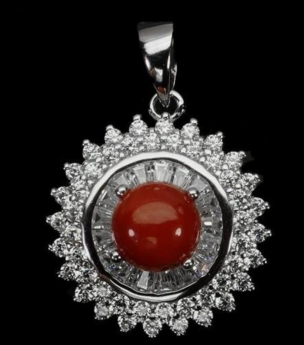 Elegant 6mm Round Coral Pendant: Elegant 6mm Round Coral Pendant This 925 sterling silver pendant features a 6mm round natural coral gemstone sourced from Italy, celebrated for its rich, warm hue and organic beauty. The polished sil