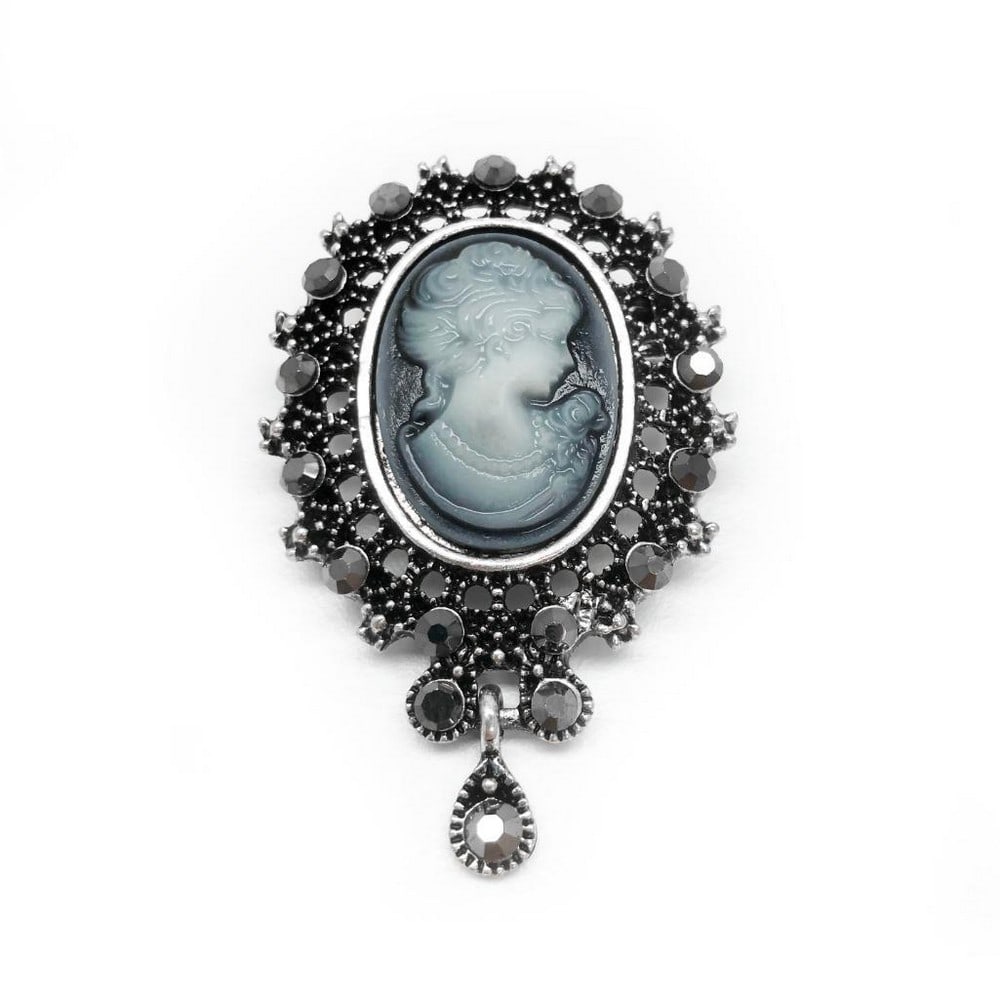 Elegant Silhouetted Gray Semi Precious Cameo Brooch: Elegant Silhouetted Gray Semi Precious Cameo Brooch. A timeless piece of refined elegance, this cameo brooch features a delicate gray classic silhouette. The subtle gray tones enhance the intricate d