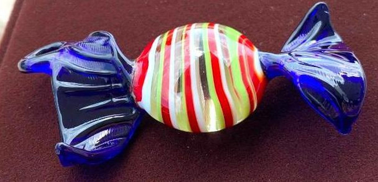 Murano Glass Candy-Shaped Tree Ornament/Pendant: Murano Glass Candy-Shaped Tree Ornament/Pendant Add a touch of festive charm to your holiday décor or jewelry collection with this handcrafted Murano glass ornament, shaped like a delightful candy.