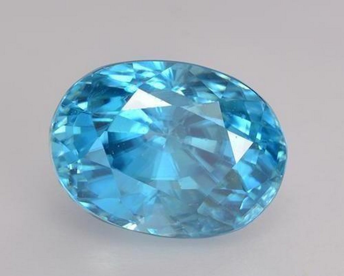 3.66 ct Natural Medium Blue Zircon, Oval Cut, VS, Cambodia: 3.66 ct Natural Medium Blue Zircon, Oval Cut, VS, Cambodia Natural zircon gemstone weighing 3.66 carats, cut in an oval facet shape with a medium blue color. The gem measures 8.53 x 6.54 x 6.29 mm and
