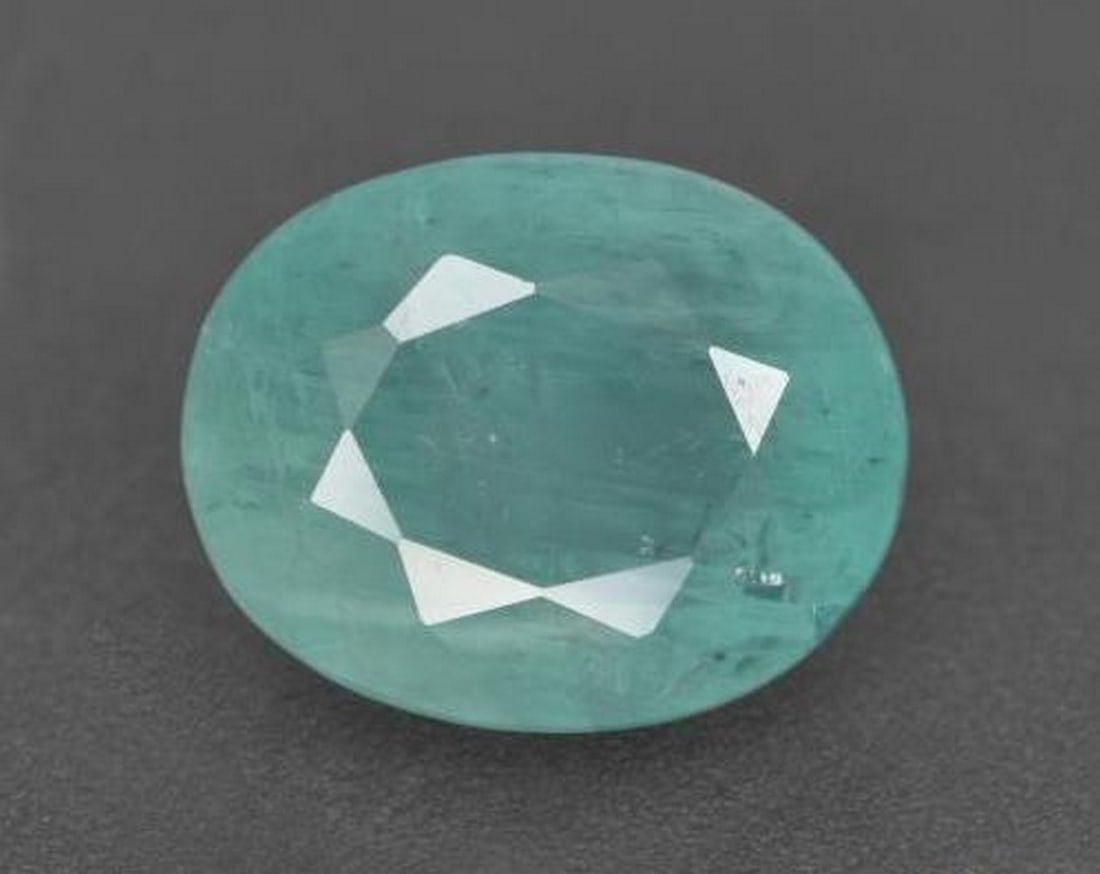 3.39 ct Natural Turquoise Grandidierite, Oval Cut, VS–SI, Madagascar: 3.39 ct Natural Turquoise Grandidierite, Oval Cut, VS–SI, Madagascar Natural grandidierite gemstone weighing 3.39 carats, cut in an oval facet shape with a turquoise color. The gem measures 10.27 x
