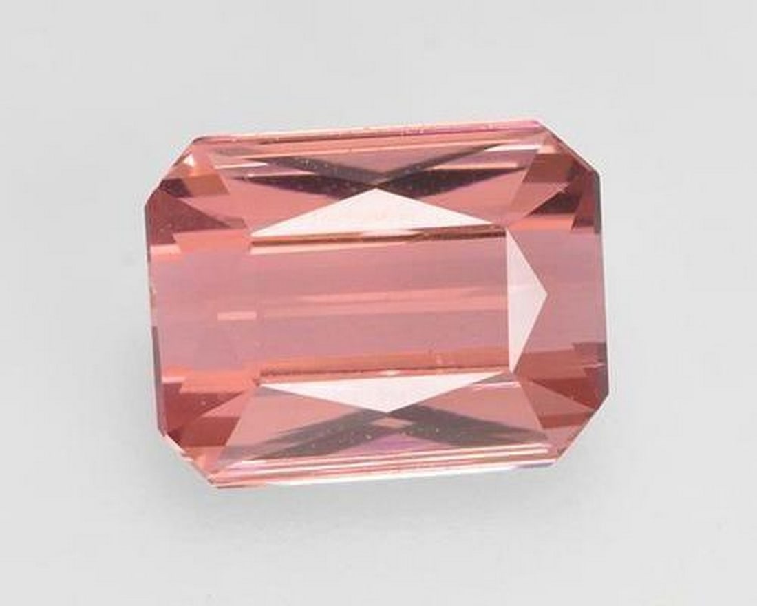 1.38 ct Natural Reddish Pink Tourmaline, Octagon/Scissor Cut, VVS–VS, Mozambique: 1.38 ct Natural Reddish Pink Tourmaline, Octagon/Scissor Cut, VVS–VS, Mozambique Natural tourmaline gemstone weighing 1.38 carats, cut in an octagon/scissor facet shape with a reddish pink color. Th
