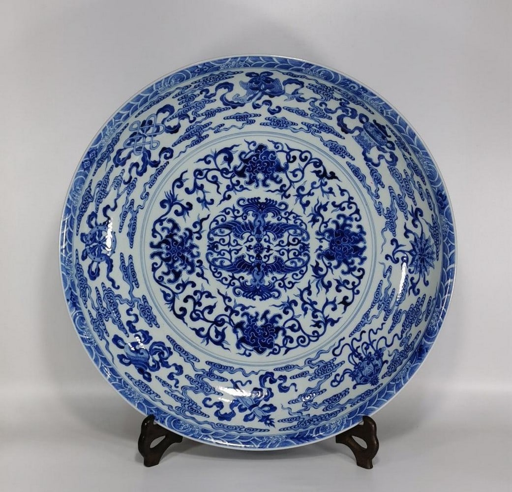 Qianlong Year of the Qing Dynasty Blue and White Eight Treasures Phoenix Large Plate: Qianlong Year of the Qing Dynasty Blue and White Eight Treasures Phoenix Large Plate A magnificent large blue and white porcelain plate from the Qianlong period of the Qing Dynasty. The central medall