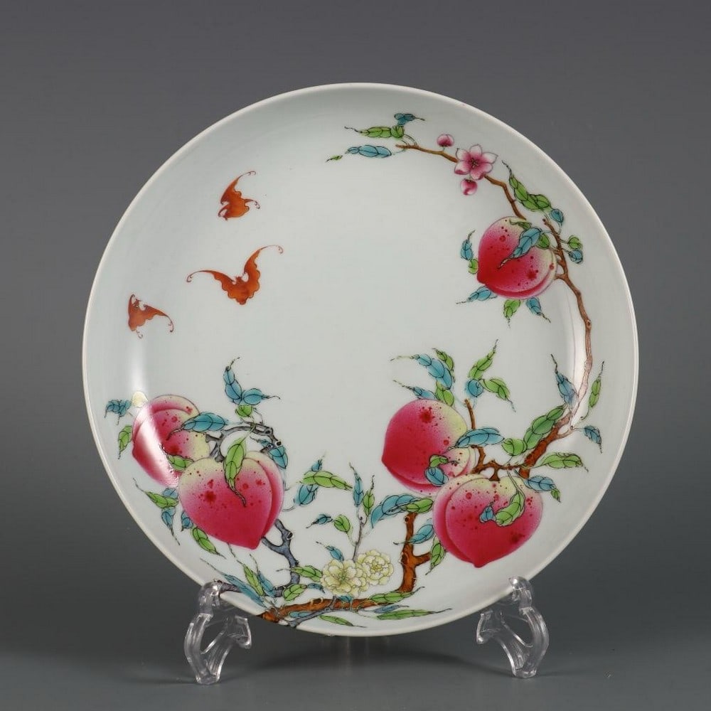Qing Yongzheng Year Famille Rose “Over the Wall Eight Peach?? Pattern Appreciation Plate: Qing Yongzheng Year Famille Rose “Over the Wall Eight Peach” Pattern Appreciation Plate A finely crafted porcelain appreciation plate from the Yongzheng period of the Qing Dynasty, decorated i
