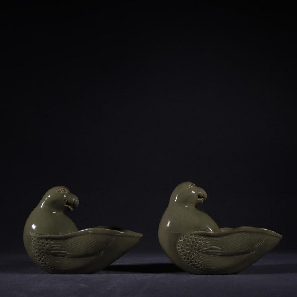 Pair of Celadon Parrot Washes from the Five Dynasties – Old Tang Dynasty Collection: Pair of Celadon Parrot Washes from the Five Dynasties – Old Tang Dynasty Collection ????? A rare pair of celadon parrot-shaped washes from the Five Dynasties period of the Tang Dynasty, crafted with