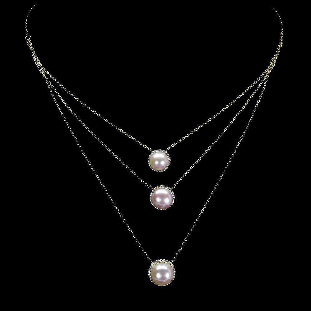18" 10mm Round Creamy Peach Pearl 925 Sterling Silver Necklace: 18" 10mm Round Creamy Peach Pearl 925 Sterling Silver Necklace This elegant 18-inch necklace showcases lustrous 10mm round creamy peach pearls, beautifully set in 925 sterling silver. The soft, wa