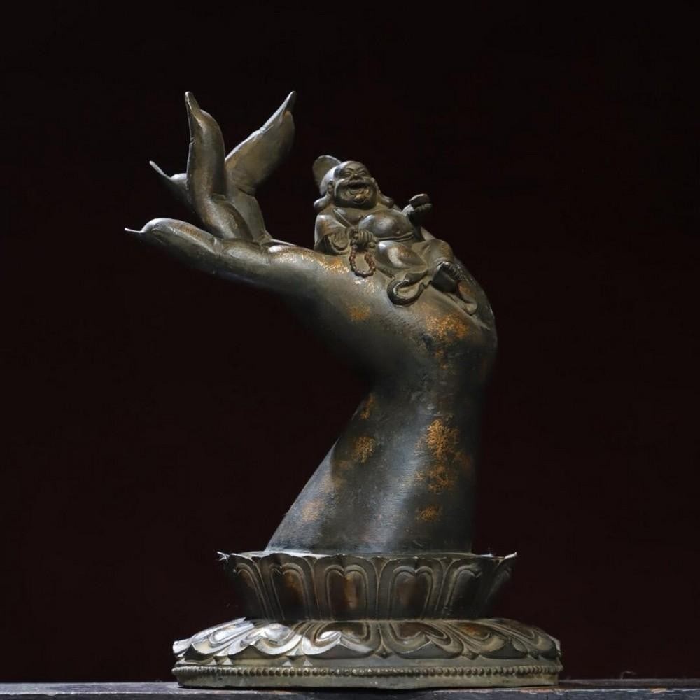 Gilded Copper Maitreya Buddha Hand Statue: Gilded Copper Maitreya Buddha Hand Statue This antique Maitreya Buddha hand statue is a remarkable piece of traditional Chinese craftsmanship, meticulously handcrafted from pure copper with a refined