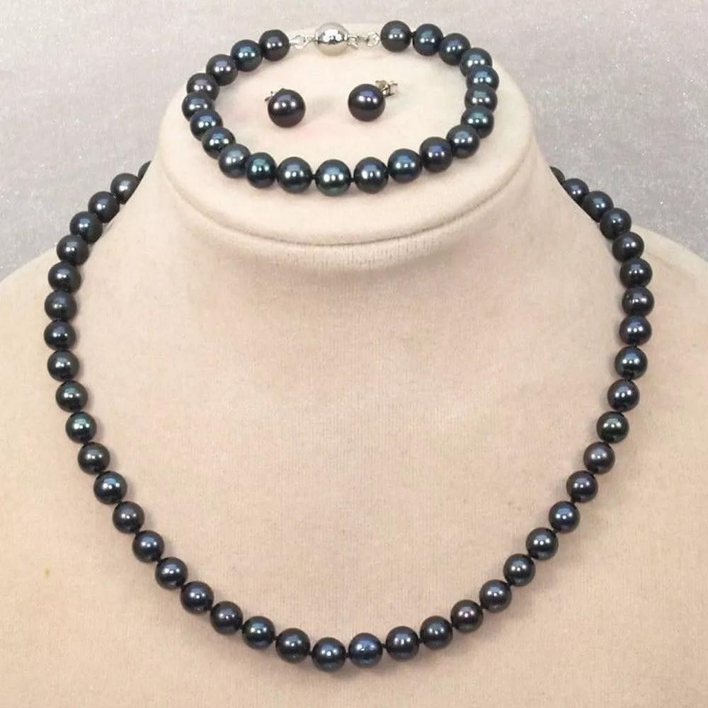 Natural Freshwater Black Pearl Necklace, Bracelet, and Earrings Set 18": Natural Freshwater Black Pearl Necklace, Bracelet, and Earrings Set 18" This elegant set features 7-8mm genuine natural freshwater black pearls, beautifully arranged in a 18" necklace, bracel